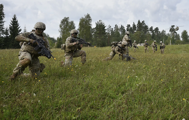 picture of soldiers training on the field