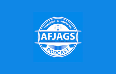 White circular logo of AFJAGS in the center with a lightblue background