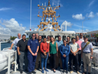 A picture of the team on the ship participating the IDARM Camri Course in Miami