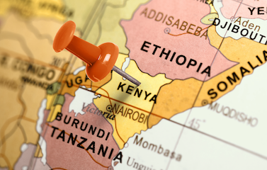 A picture of an orange pin firmly placed on the map, precisely marking the location of Kenya.