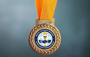 Gold medal with ISG logo