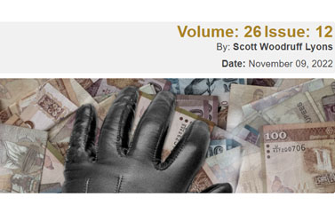 A picture of a  leather glove on top of a pile of money